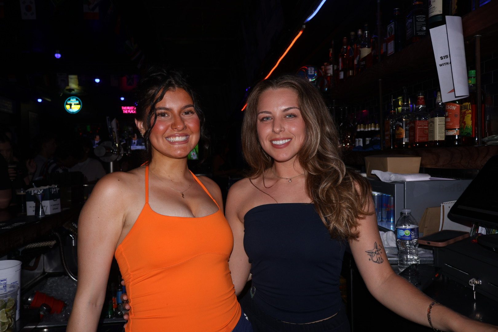 Friends at the bar at River Street Garage