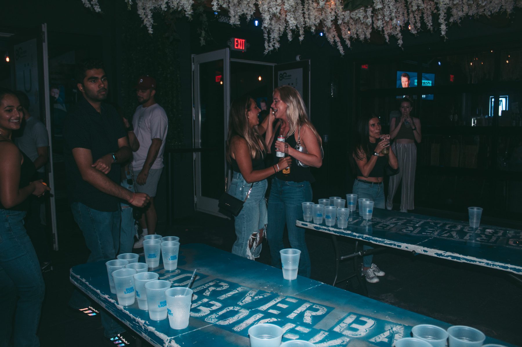 Guests playing beer pong at River Street Garage
