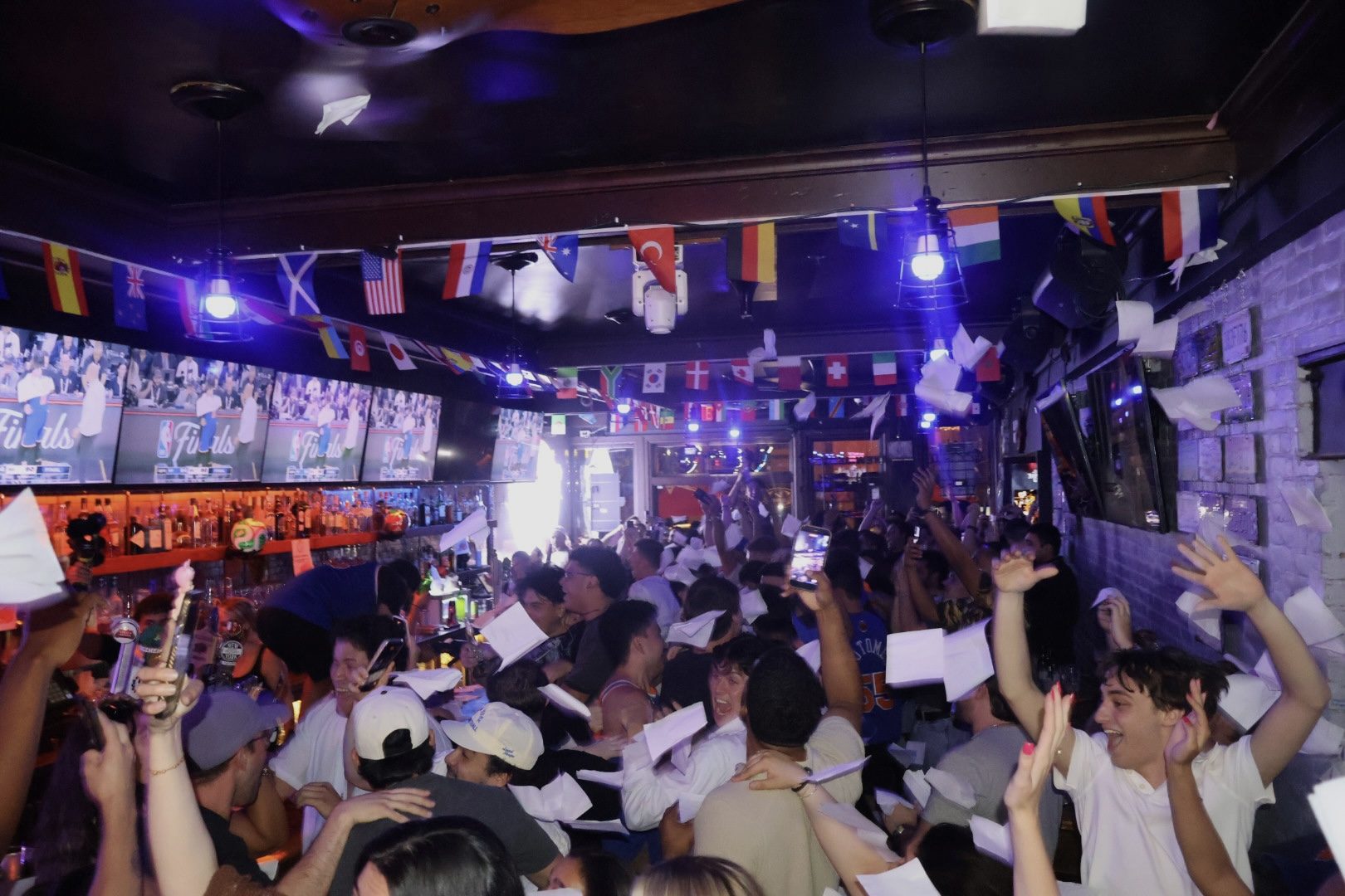 Packed crowd celebrating at River Street Garage