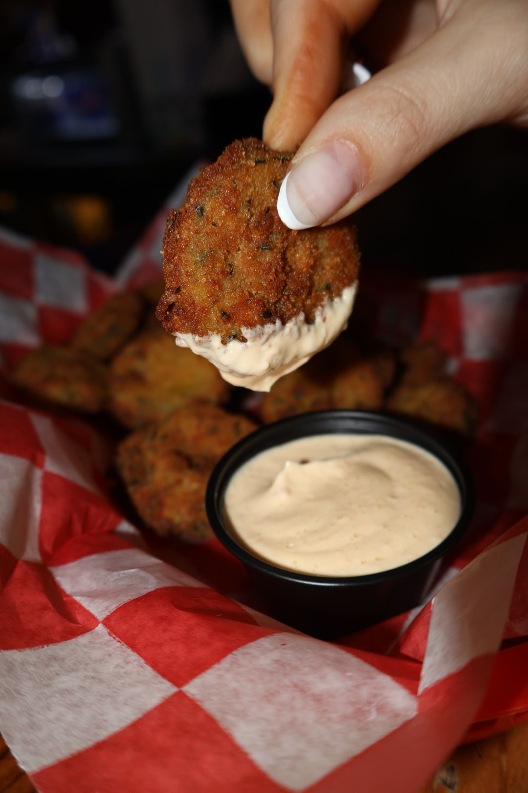 Fried pickles with dipping sauce at River Street Garage