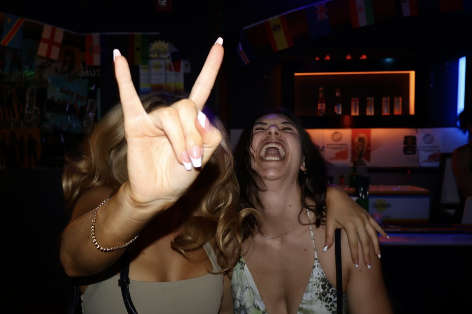 Friends cheersing at River Street Garage
