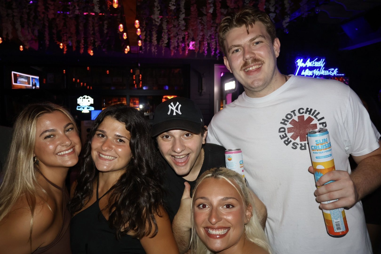 Friends in the license plate room at River Street Garage