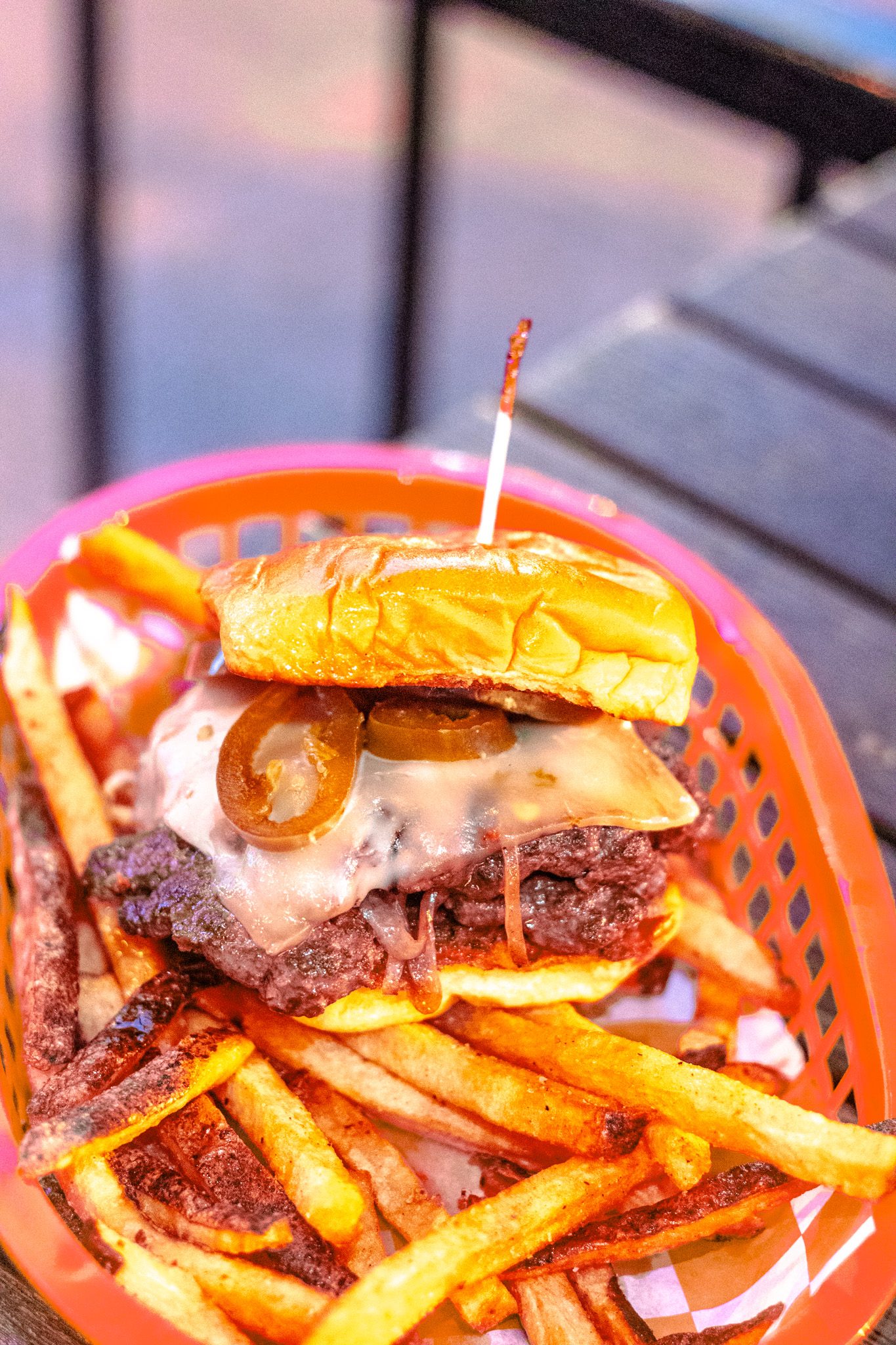 A River Street Garage smashburger with pepper jack, jalapenos and fries